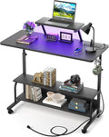 Height Adjustable Standing Desk with Power Outlets and LED Lights - 39" Manual Stand Up Desk with Monitor Stand and Storage Shelves Small Mobile Rolling Computer Desk Portable Laptop Table, Black