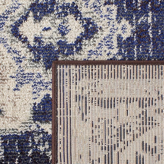 SAFAVIEH Monaco Collection Area Rug - 9' x 12', Ivory & Navy, Boho Chic Medallion Distressed Design, Non-Shedding & Easy Care, Ideal for High Traffic Areas in Living Room, Bedroom (MNC243C)