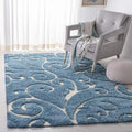 SAFAVIEH Florida Shag Collection Area Rug - 5'3" x 7'6", Light Blue & Cream, Scroll Design, Non-Shedding & Easy Care, 1.2-inch Thick Ideal for High Traffic Areas in Living Room, Bedroom (SG455-6011)
