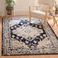 SAFAVIEH Monaco Collection Area Rug - 9' x 12', Ivory & Navy, Boho Chic Medallion Distressed Design, Non-Shedding & Easy Care, Ideal for High Traffic Areas in Living Room, Bedroom (MNC243C)
